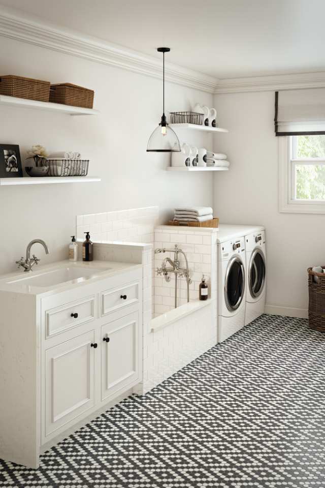 black and white penny tile in modern farmhouse laundry room with pet shower